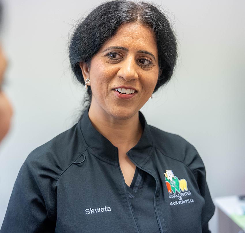 close up on a female staff member at the Dental Center of Jacksonville, FL