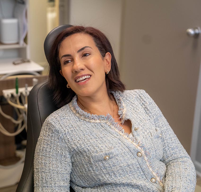 a dental patient seated at the dental chair in the Dental Center of Jacksonville, FL