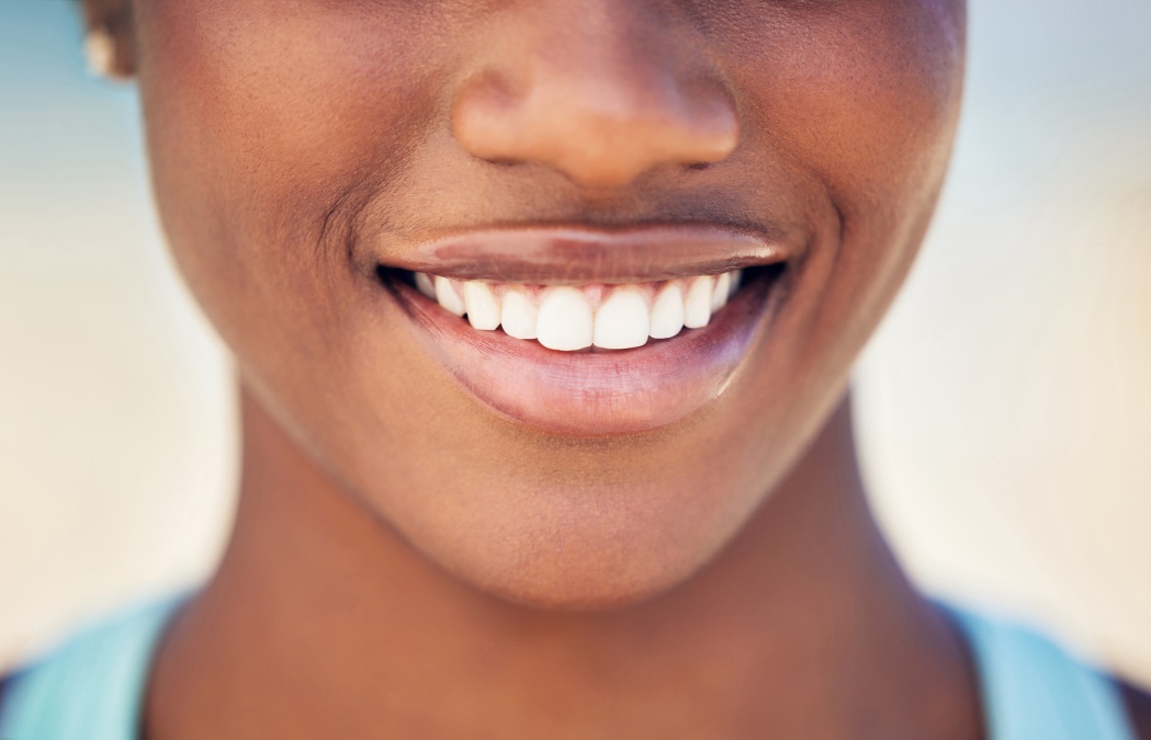 Closeup, mouth and woman with smile, teeth whitening and oral hygiene treatment with wellness. Person, outdoor or dental care with gum cleaning, veneers or orthodontics satisfaction with fresh breath
